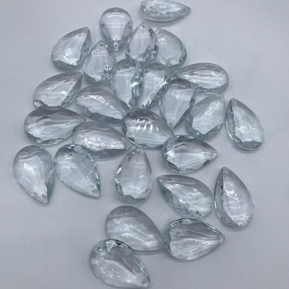 Glass teardrop beads. 2”